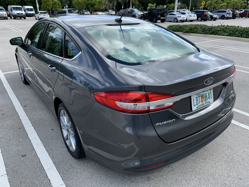 Ford Fusion Hybrid for hire